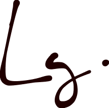 Logo typographique manuscrit « Lg » en brun foncé sur fond transparent.
